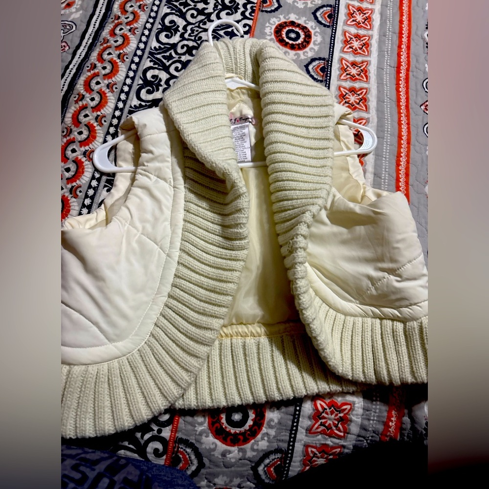 This is a white vest never been used size large in kids